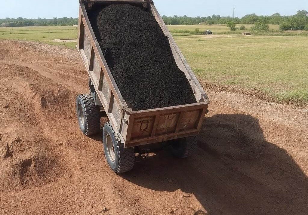 Transport ziemi czarnej na budowę